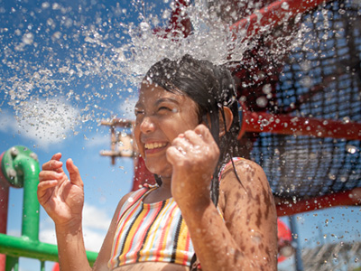 Kids coming out of the water slide