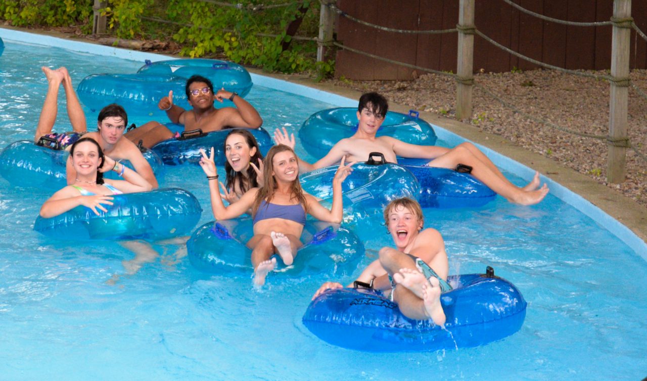 guest floating in tubes in the lazy river