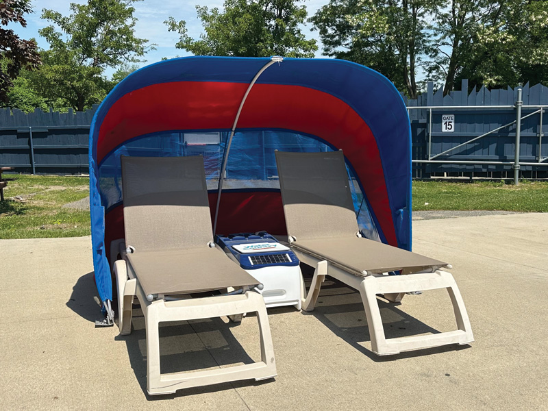 tWO people in a cabana