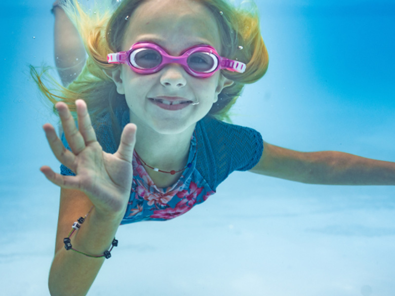 Girl swimming underwater